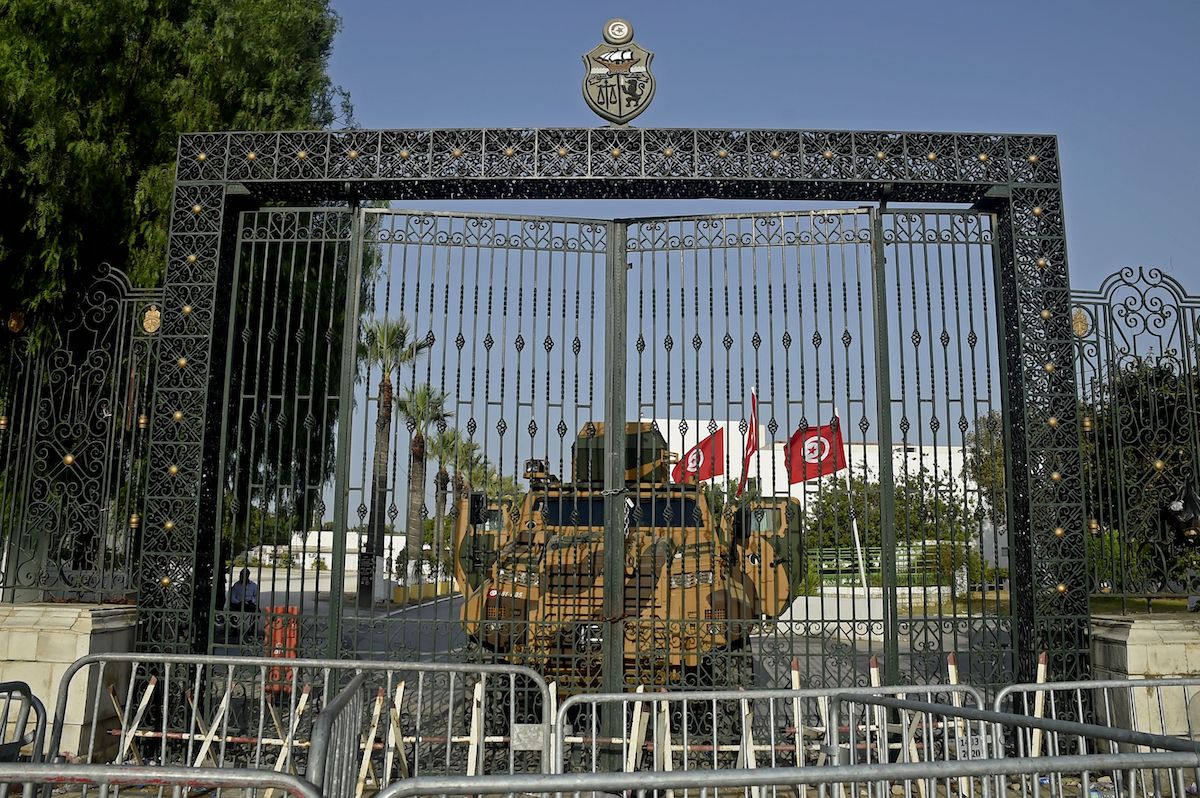 Tunisian army barricade the parliament building in the capital Tunis on 26 July 2021, after the president dismissed the prime minister and ordered parliament closed for 30 days. [YASSINE MAHJOUB/AFP via Getty Images]