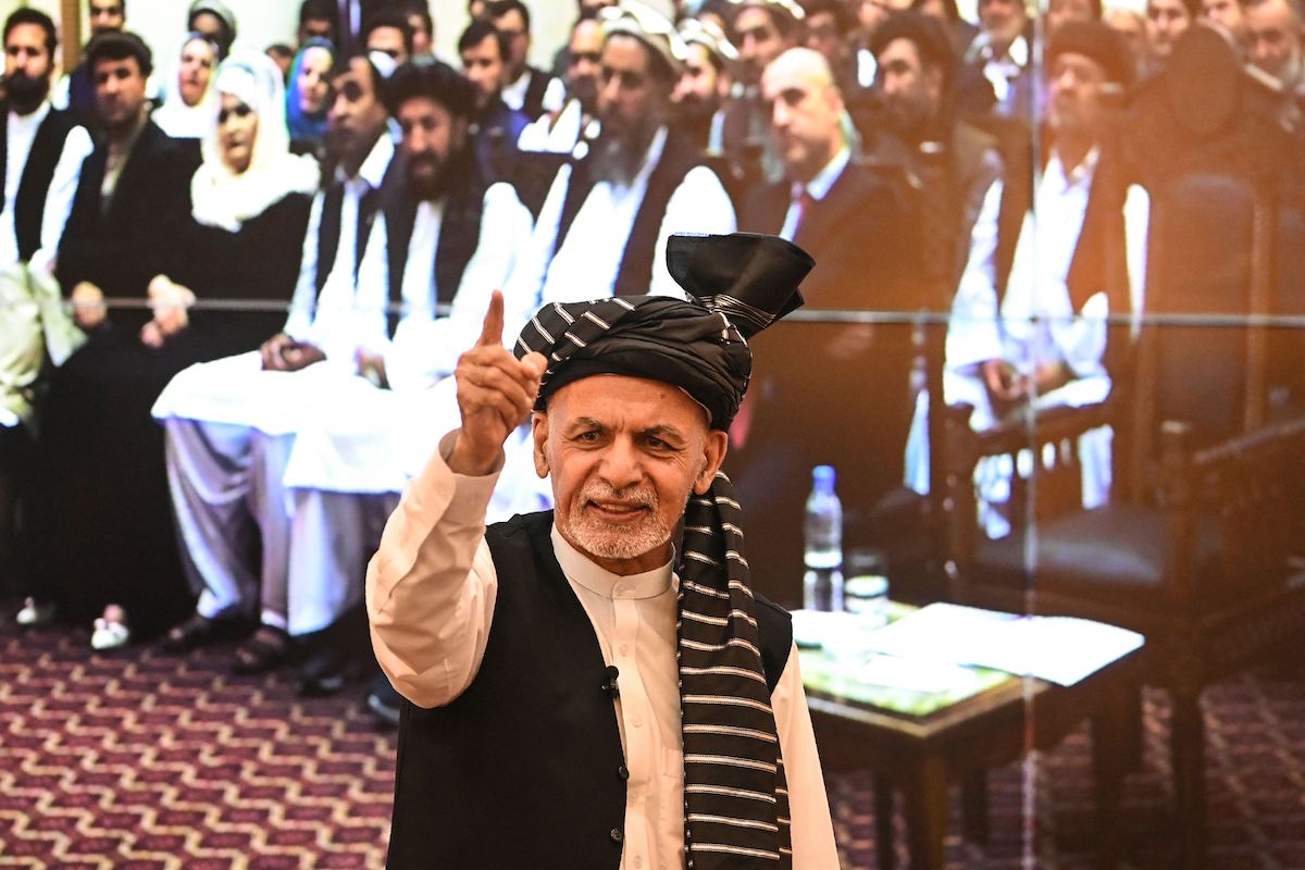 Afghanistan's President Ashraf Ghani gestures during a function at the Afghan presidential palace in Kabul on 4 August 2021. [SAJJAD HUSSAIN/AFP via Getty Images]