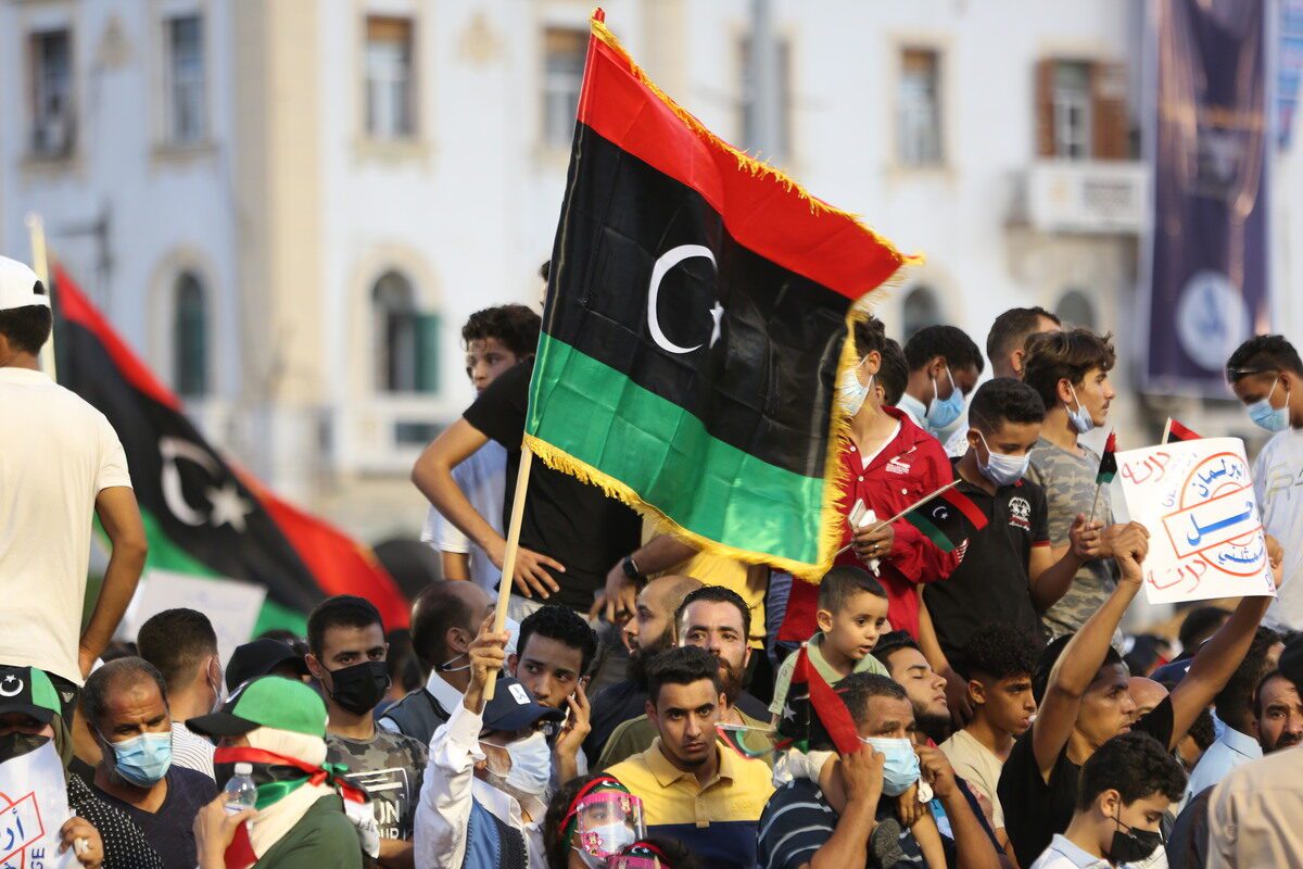 Thousands of Libyans stage a protest against the "withdrawal the vote of confidence from the government" decision of the House of Representatives (TM), chaired by warlord Khalifa Haftar's political ally Akile Salih, at Martyrs' Square in Tripoli, Libya on 24 September 2021. [Hazem Turkia - Anadolu Agency]