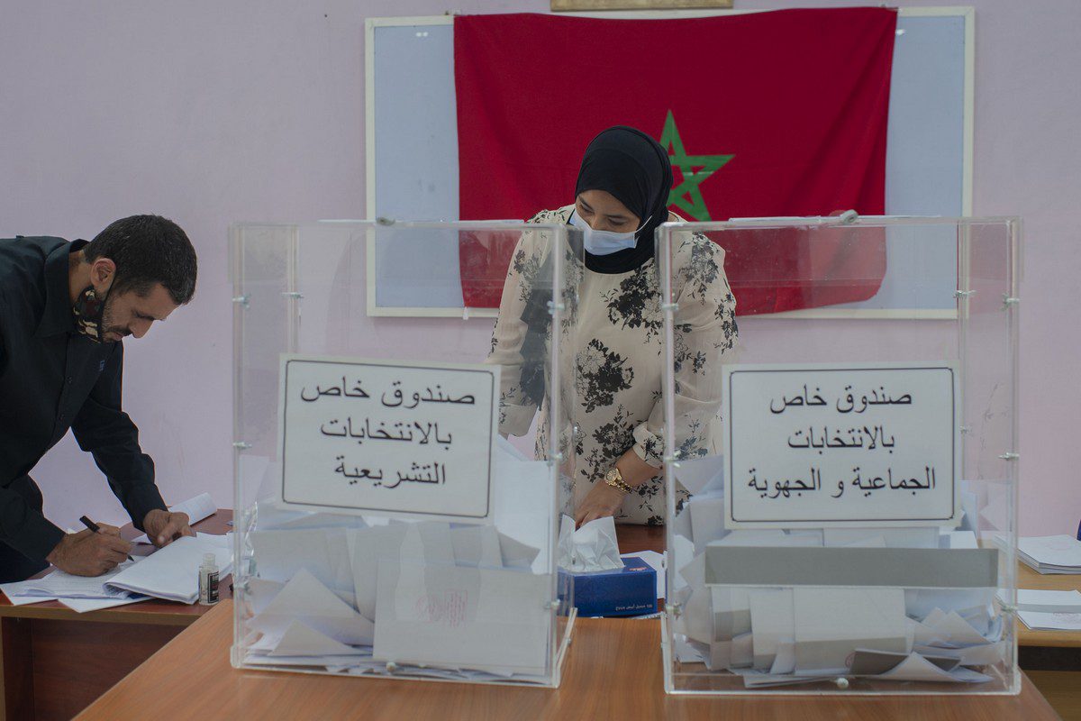 People cast their votes in the parliamentary and municipal elections, at a polling station in Rabat, Morocco on 8 September 2021 [Jalal Morchidi/Anadolu Agency]