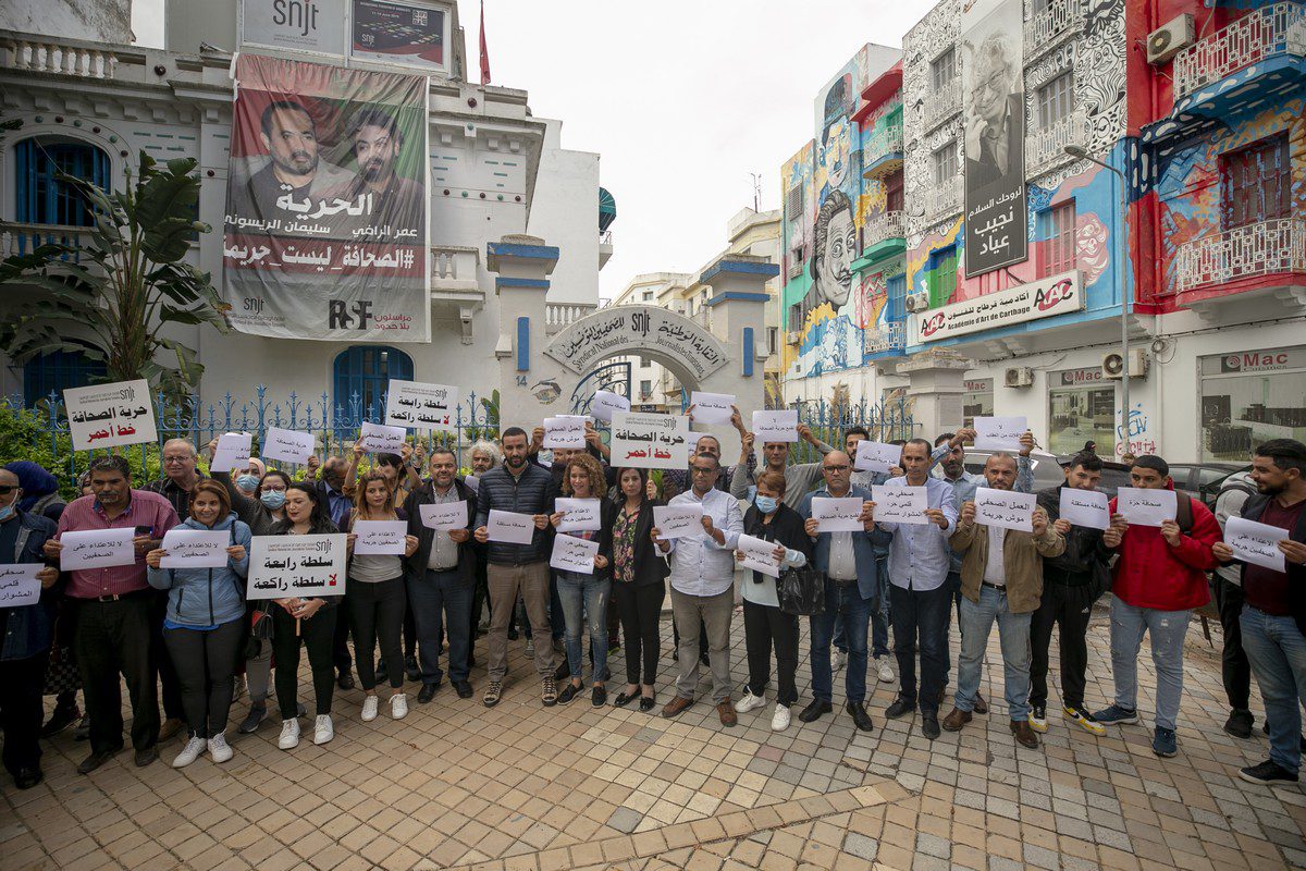 The Journalists' Syndicate (SNJT) members stage a protest against the attacks towards media members in front of the union headquarters in Tunis, Tunisia on October 14, 2021. [Yassine Gaidi/Anadolu Agency]
