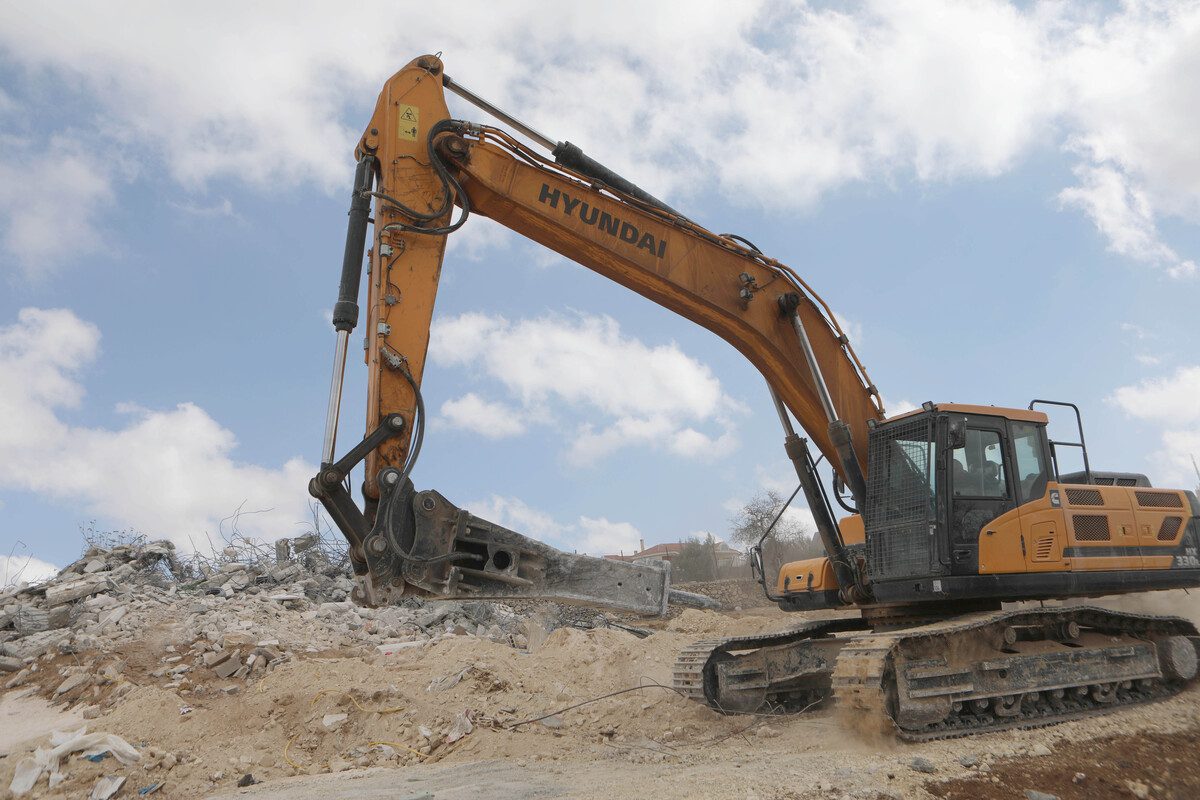 Israeli bulldozers, in occupied West Bank on October 18, 2021 [Mamoun Wazwaz/Anadolu Agency]