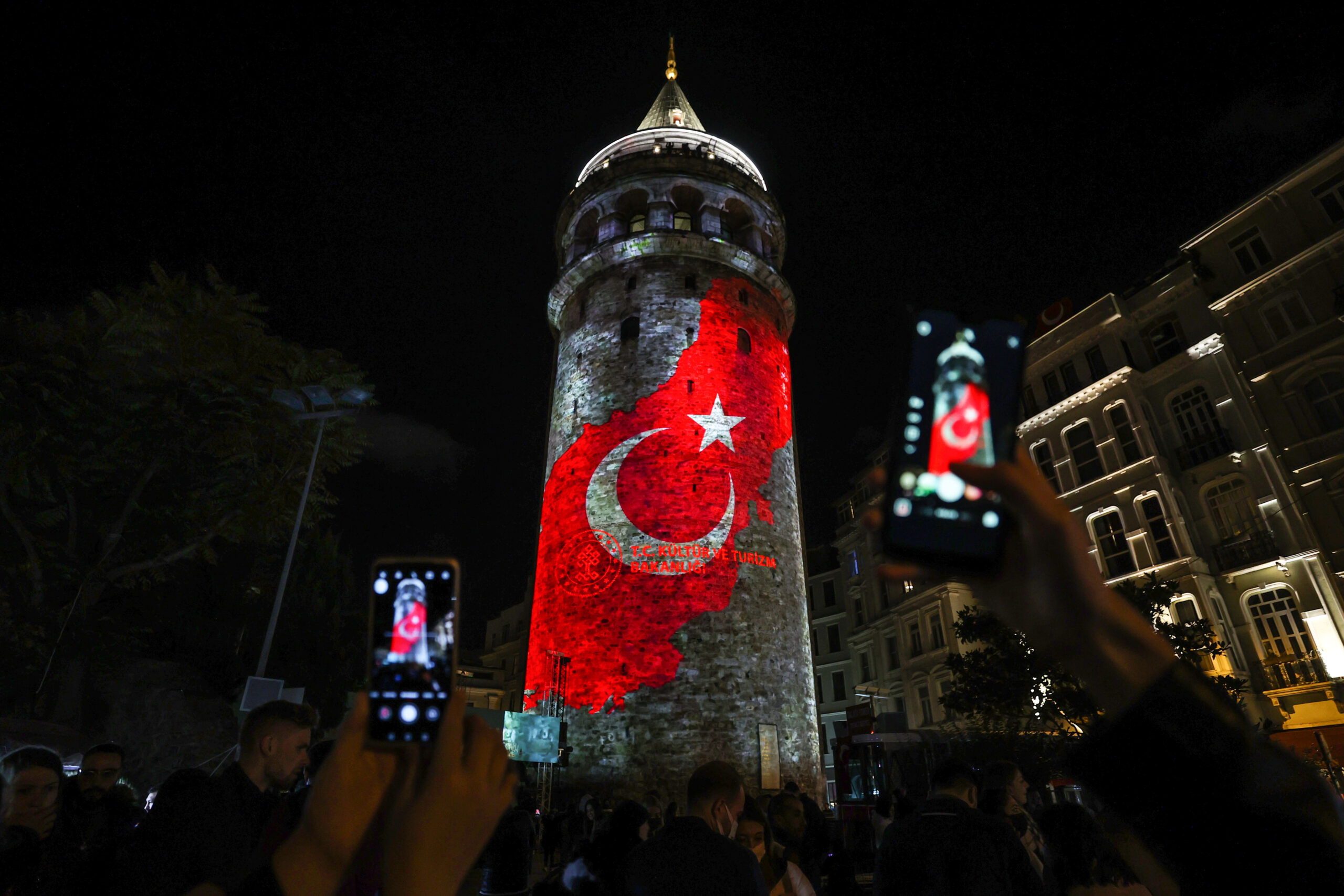 The Galata Tower is illuminated during the 98th anniversary of the Republic Day of Turkey in Istanbul, Turkey on October 29, 2021 [Mehmet Murat Önel/Anadolu Agency]
