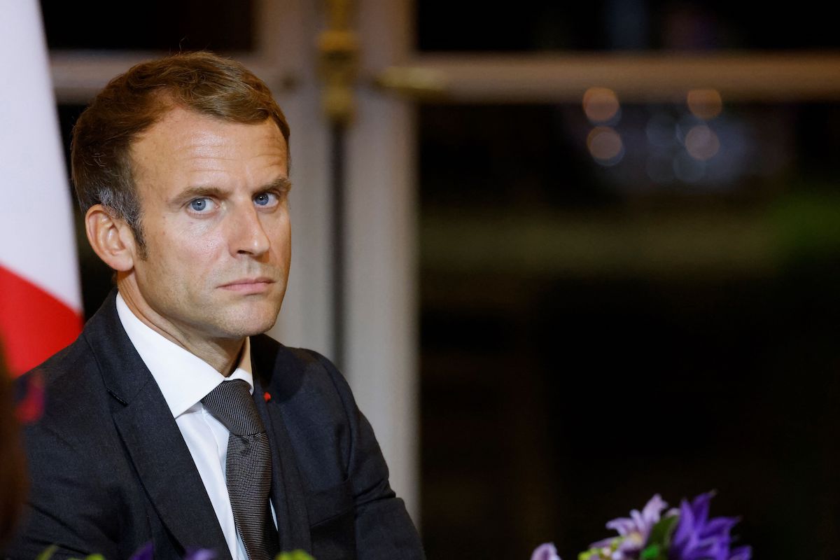 French President Emmanuel Macron reacts as he hosts a dinner at the Elysee Palace, on 30 September 2021 as part of the closing ceremony of the Africa2020 season, which presented the views of the civil society from the African continent and its recent diaspora in different sectors of activity. [LUDOVIC MARIN/POOL/AFP via Getty Images]