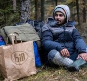 24-year-old Ali Abd Alwareth from Lebanon sits in the woods outside the Emergency State zone at the Polish-Belarusian border and waits for arrival of Border Guard patrol, October 22, 2021. - Exhausted and trapped in a cold, cruel forest, Lebanese barber Ali Abd Alwareth said he regretted his week-long bid to enter the European Union via the Belarus-Poland border. (Photo by Wojtek RADWANSKI / AFP) (Photo by WOJTEK RADWANSKI/AFP via Getty Images)
