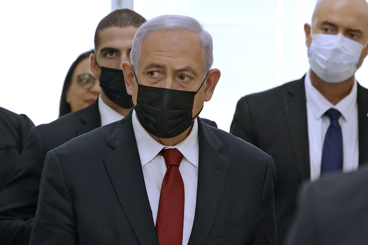 JERUSALEM - NOVEMBER 16: Former Israeli prime minister Benjamin Netanyahu (C) arrives for a court hearing on corruption charges at the Jerusalem District Court as he made his third courtroom appearance, in Jerusalem on November 16, 2021. ( AFP/Jack Guez/Pool - Anadolu Agency )