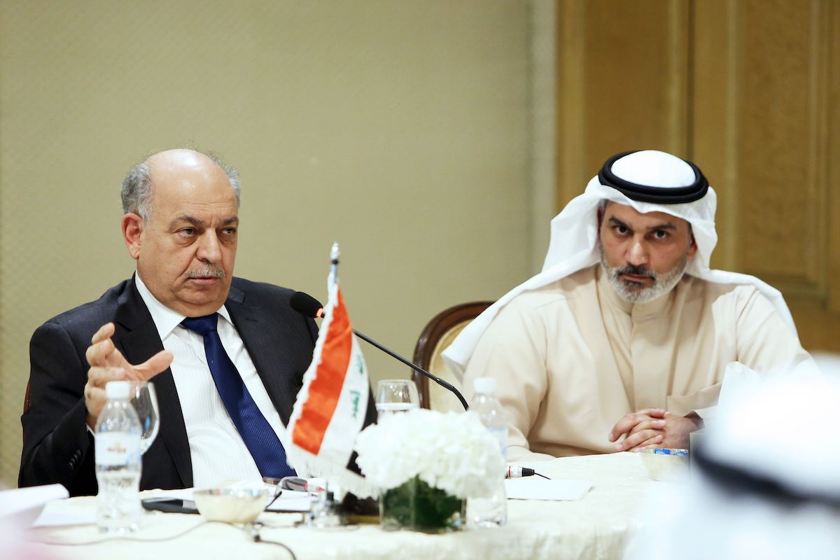 Iraqi oil minister Thamer Ghadban (R) speaks as OPEC governor for Kuwait Haitham al-Ghais looks on during a joint press conference at the end of the Organization of Arab Petroleum Exporting Countries (OAPEC) meeting in Kuwait City on 23 December 2018. [YASSER AL-ZAYYAT/AFP via Getty Images]