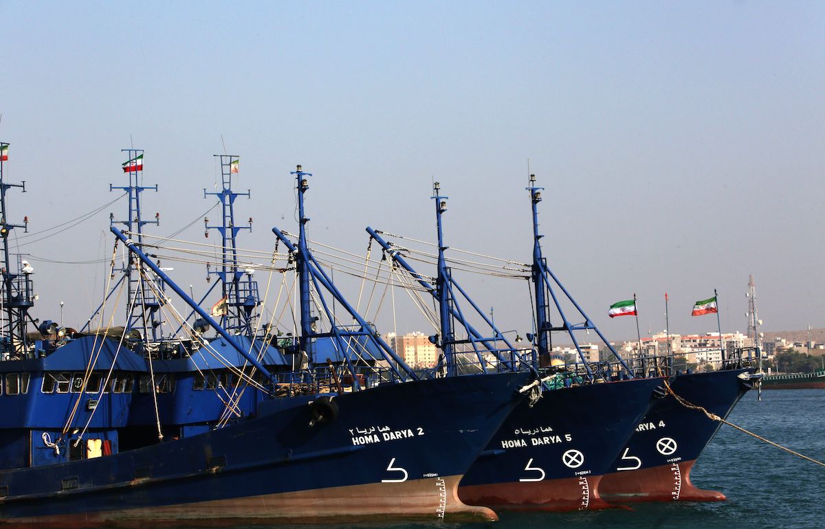 Ships are pictured off the Iranian port city of Bandar Abbas, which is the main base of the Islamic republic's navy and has a strategic position on the Strait of Hormuzon April 30, 2019. [ATTA KENARE/AFP via Getty Images]