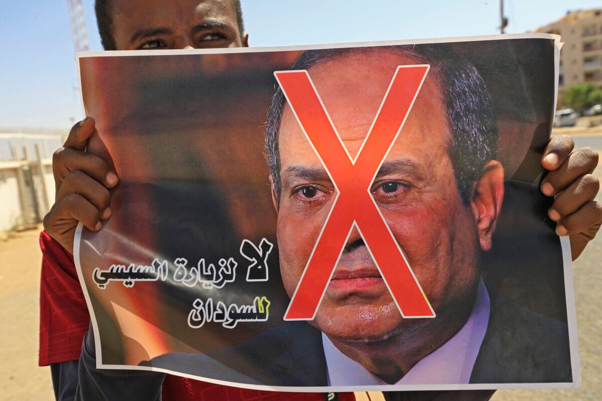 Sudanese demonstrators gather during a demonstration against the visit of the Egyptian President to the capital Khartoum on March 6, 2021 [ASHRAF SHAZLY/AFP via Getty Images]