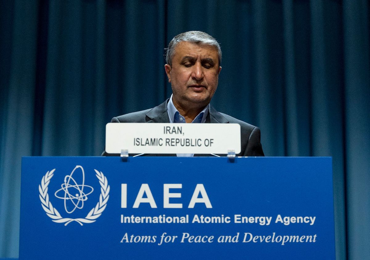 Chief of the Atomic Energy Organization of Iran Mohammad Eslami looks down as he delivers a speech during the International Atomic Energy Agency (IAEA) General Conference, an annual meeting of all the IAEA member states, at the agency's headquarters in Vienna, Austria on 20 September 2021. [JOE KLAMAR/AFP via Getty Images]