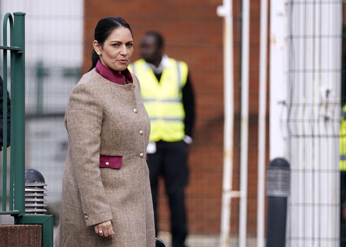Britain's Home Secretary Priti Patel arrives for a regional cabinet meeting at Rolls Royce in Bristol, southwest England, on 15 October 2021. [STEVE PARSONS/POOL/AFP via Getty Images]