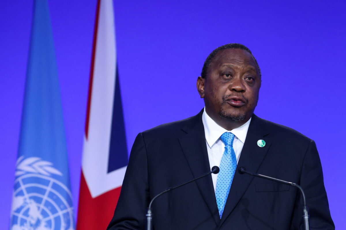 GLASGOW, SCOTLAND - NOVEMBER 01: Kenya's President Uhuru Kenyatta speaks during the UN Climate Change Conference COP26 at SECC on November 1, 2021 in Glasgow, United Kingdom. World Leaders attending COP26 are under pressure to agree measures to deliver on emission reduction targets that will lead the world to net-zero by 2050. Other goals of the summit are adapting to protect communities and natural habitats, mobilising $100billion in climate finance per year and get countries working together to meet the challenges of the climate crisis. (Photo by Yves Herman - WPA Pool/Getty Images)