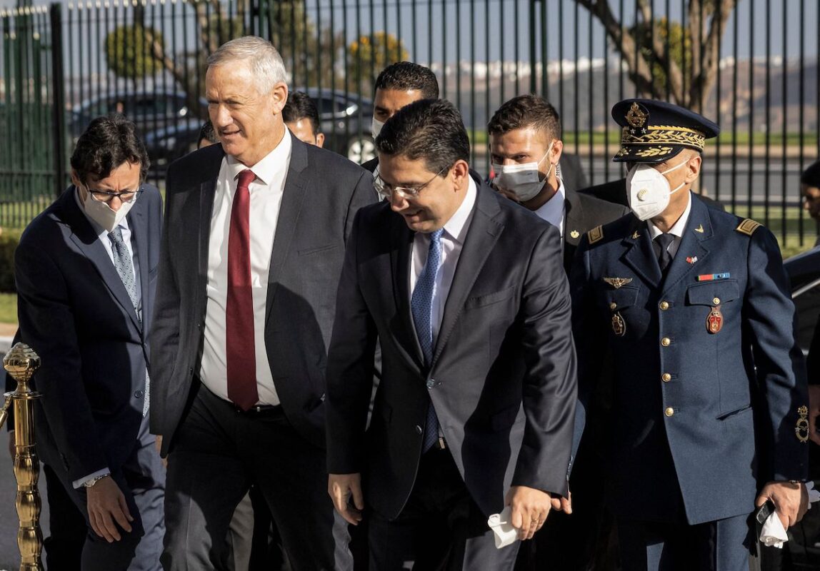Morocco's Foreign Minister Nasser Bourita (C) receives Israel's Defence Minister Benny Gantz (2nd-L) in the capital Rabat on 24 November 2021. [FADEL SENNA/AFP via Getty Images]