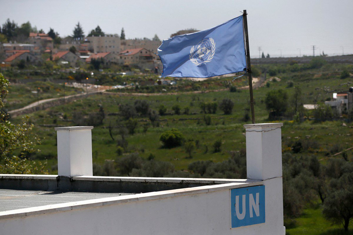 A picture shows a United Nations flag fluttering above a UN-run school in Ramallah on 8 April 2021 [ABBAS MOMANI/AFP/Getty Images]