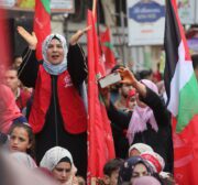 The Popular Front for the Liberation of Palestine commemorates its 54th anniversary in front of the Red Cross headquarters in Gaza, in solidarity with Palestinian prisoners held in Israeli jails on 13 December 2021 [Mohammed Asad/Middle East Monitor]