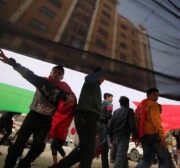 The Popular Front for the Liberation of Palestine commemorates its 54th anniversary in front of the Red Cross headquarters in Gaza, in solidarity with Palestinian prisoners held in Israeli jails on 13 December 2021 [Mohammed Asad/Middle East Monitor]