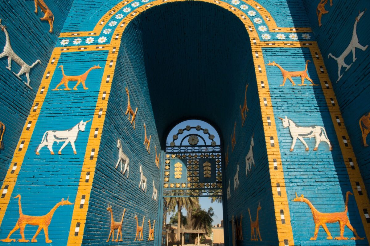 A picture taken on June 29, 2019 shows a replica of the Ishtar Gate at the ancient archaeological site of Babylon, south of the Iraqi capital Baghdad. - UNESCO's World Heritage Committee voted on June 5, 2019 to list the sprawling Mesopotamian metropolis of Babylon as a World Heritage Site after three decades of lobbying efforts by Iraq. (Photo by Hussein FALEH / AFP) (Photo credit should read HUSSEIN FALEH/AFP via Getty Images)