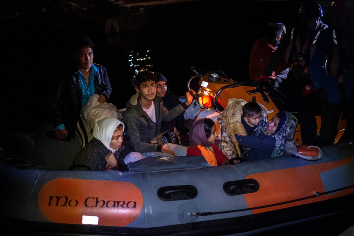 Migrants are seen on board on October 2, 2019 [ANGELOS TZORTZINIS/AFP via Getty Images]