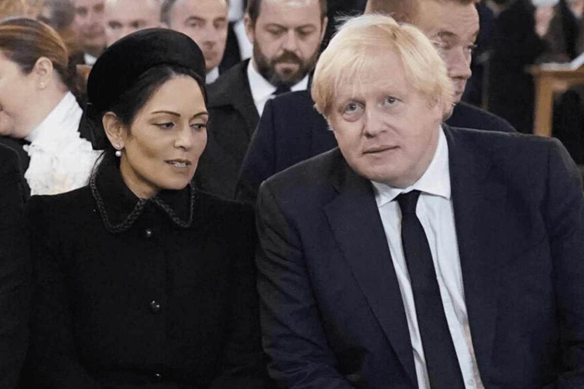 Home Secretary Priti Patel and Prime Minister Boris Johnson attend a requiem mass for Conservative MP David Amess at Westminster Cathedral in London on November 23, 2021 [STEFAN ROUSSEAU/POOL/AFP via Getty Images]