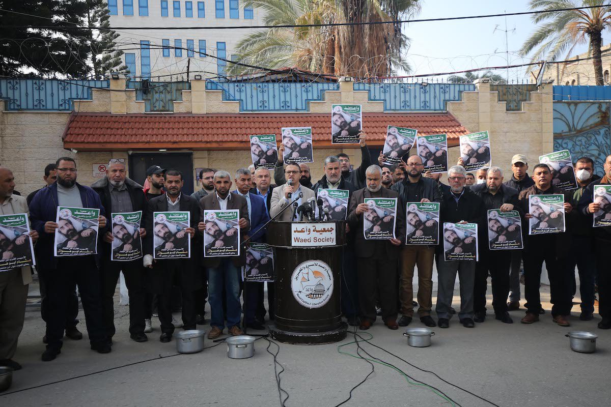 Palestinians in Gaza protest in solidarity in solidarity with hunger striker Hisham Abu Hawash on 2 January 2022 [Mohammed Asad/Middle East Monitor]