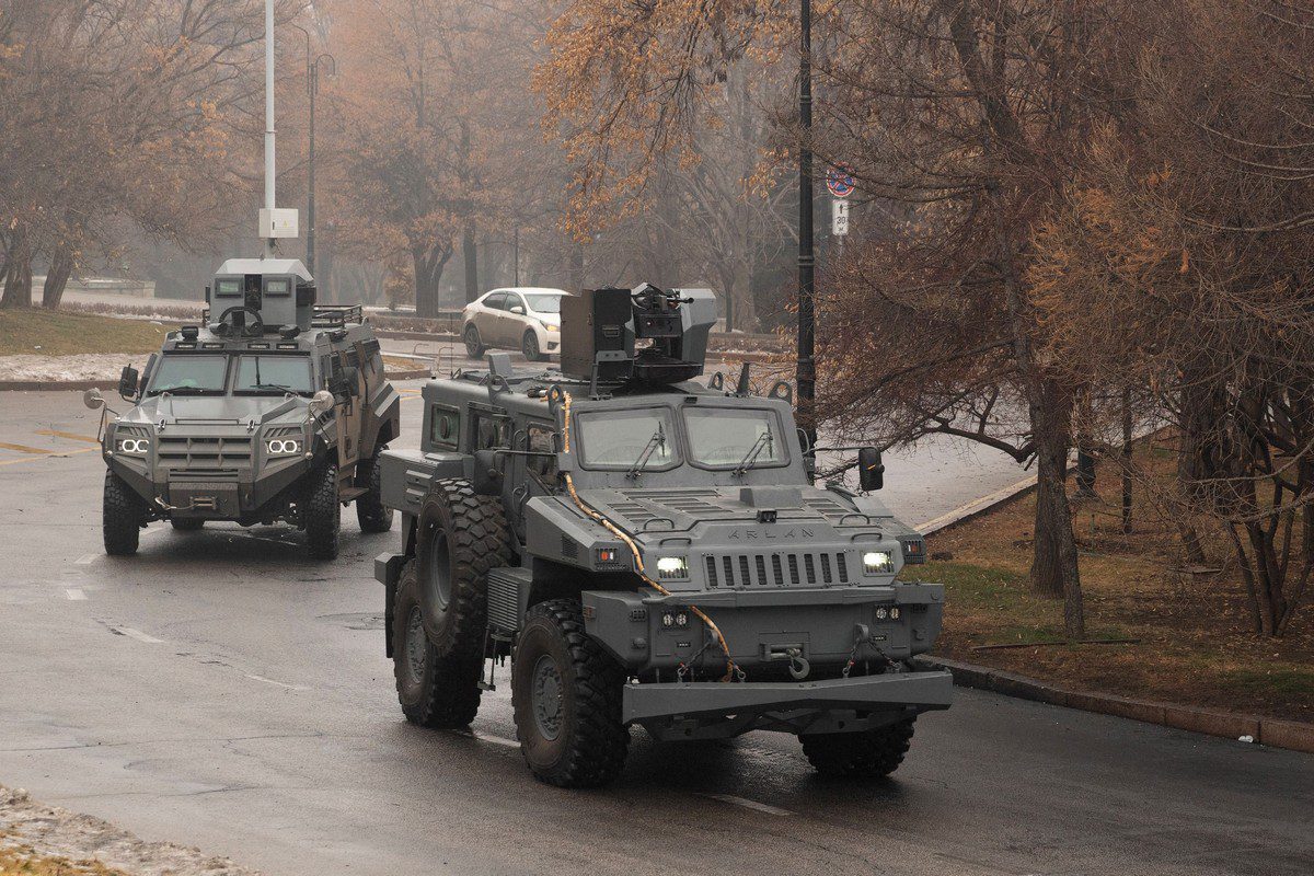 Military vehicles patrol streets in Kazakhstan on 7 January 2022 [ALEXANDR BOGDANOV/AFP/Getty Images]