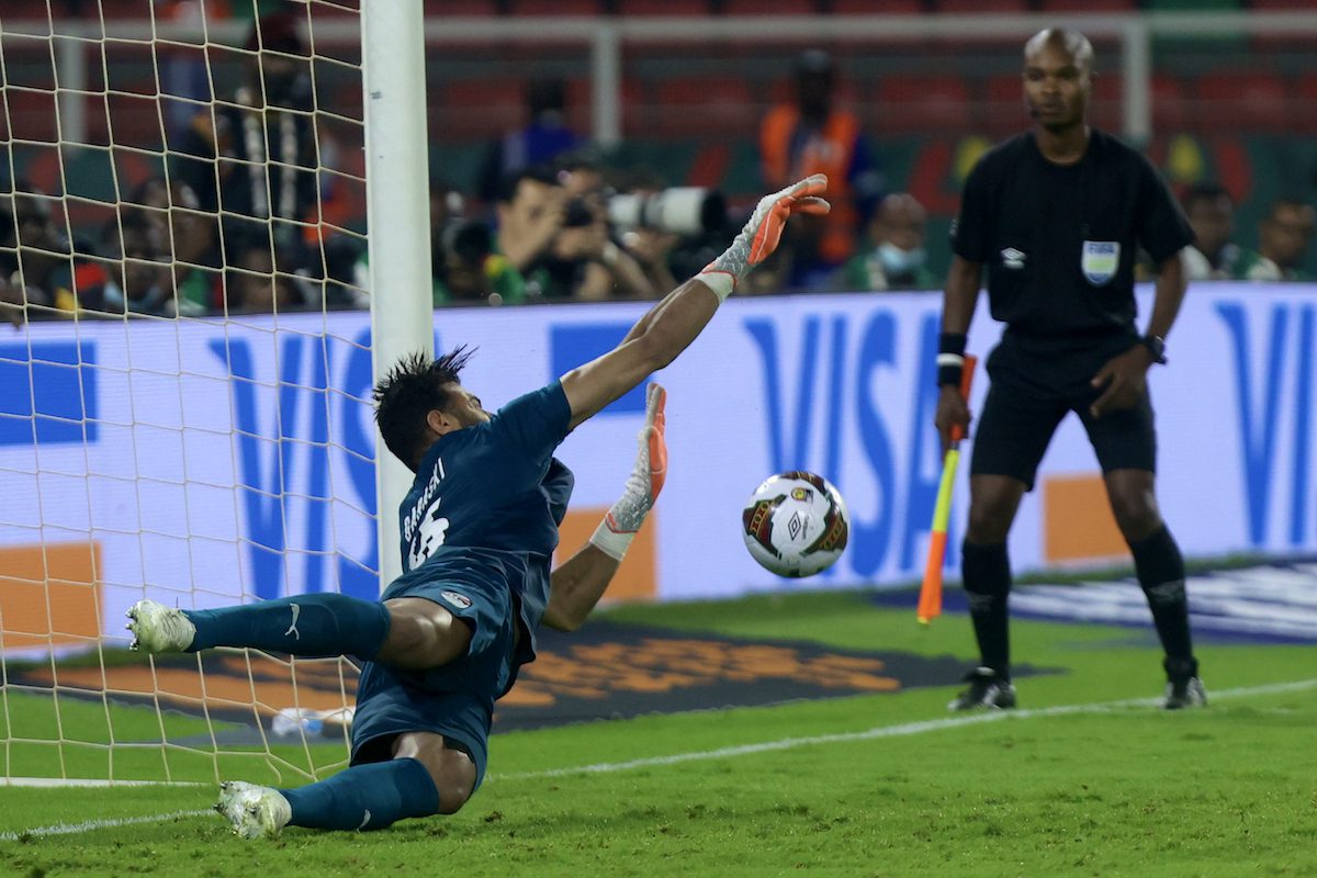 YAOUNDE, CAMEROON - FEBRUARY 03: Goalkeeper Mohamed Abou Gabal of Egypt saves a penalty during the Africa Cup of Nations (CAN) 2021 semi-final football match between Cameroon and Egypt at Stade d'Olembe in Yaounde, Cameroon on February 03, 2022.​​​​​​​ ( Fareed Kotb - Anadolu Agency )