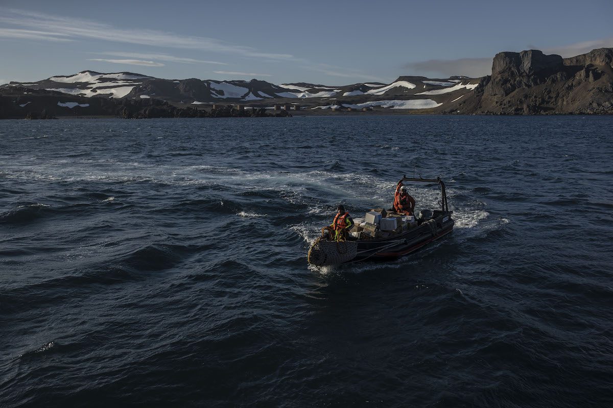 ANTARCTICA - FEBRUARY 04: Belongings of Turkey's expedition team are carried to the land on the coast of King George Island as the 20-member team of Turkiye’s sixth National Antarctic Science Expedition reached in King George Island on February 04, 2022 in Antarctica. After a seven-day quarantine period in Puerto Williams due to COVID-19 measures, the expedition team left for King George Island by plane. ( Şebnem Coşkun - Anadolu Agency )