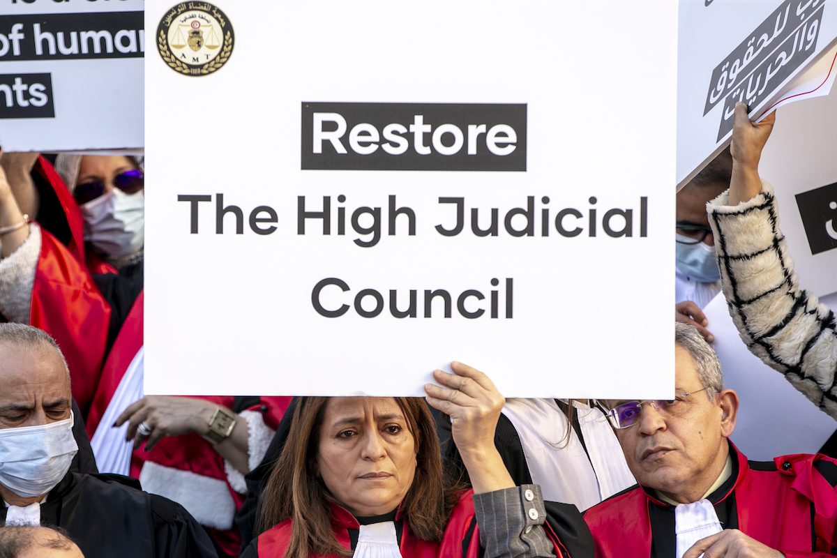 Judges and lawyers gather to protest President of Tunisia, Kais Saied's decision to dissolve the Supreme Judicial Council in front of Palais de Justice in Tunis, Tunisia on 10 February 2022 [Yassine Gaidi/Anadolu Agency]