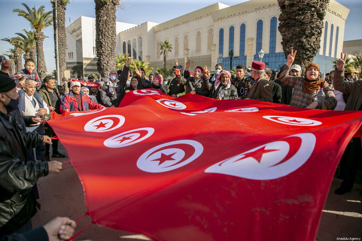 TUNIS, TUNISIA - FEBRUARY 13: Hundreds take part in a protest against dissolving the Supreme Judiciary Council by President Kais Saied in Tunis, Tunisia, February 13, 2022. ( Yassine Gaidi - Anadolu Agency )