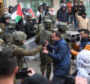 Israeli forces clash with Palestinians in a rally marking the 28th anniversary of the Ibrahimi Mosque massacre in Hebron, West Bank 25, 2022 [Mamoun Wazwaz / Anadolu Agency]