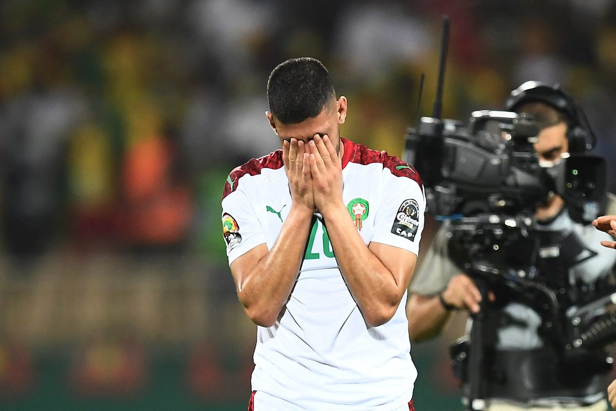 Morocco's forward Tarik Tissoudali reacts after losing the Africa Cup of Nations (CAN) 2021 quarter-final football match between Egypt and Morocco at Stade Ahmadou Ahidjo in Yaounde on 30 January 2022. [CHARLY TRIBALLEAU/AFP via Getty Images]
