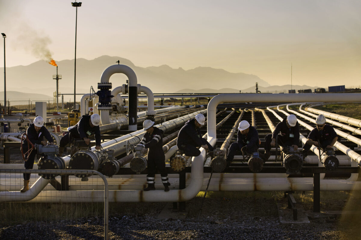 Workers working at the Kawergosk refinery [Reza/Getty Images]