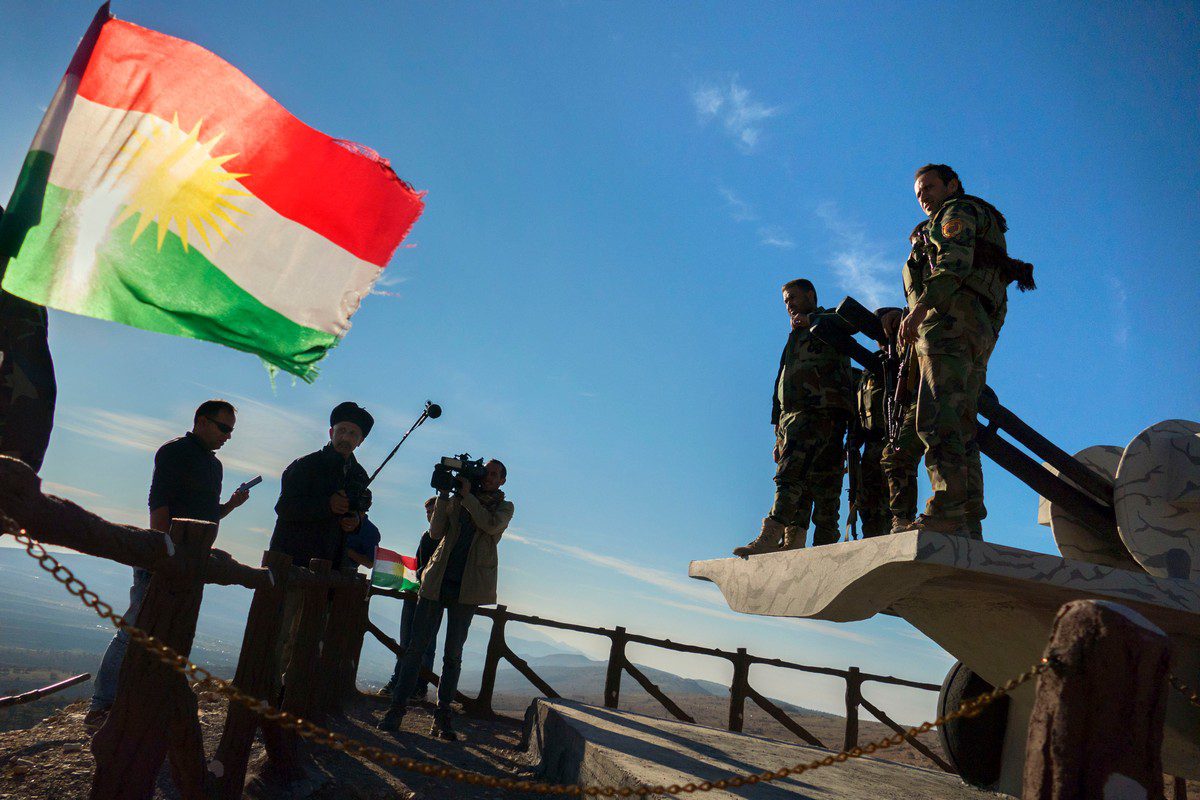 Kurdish flag near the town of Shingal on 3 August 2014 [Reza/Getty Images]
