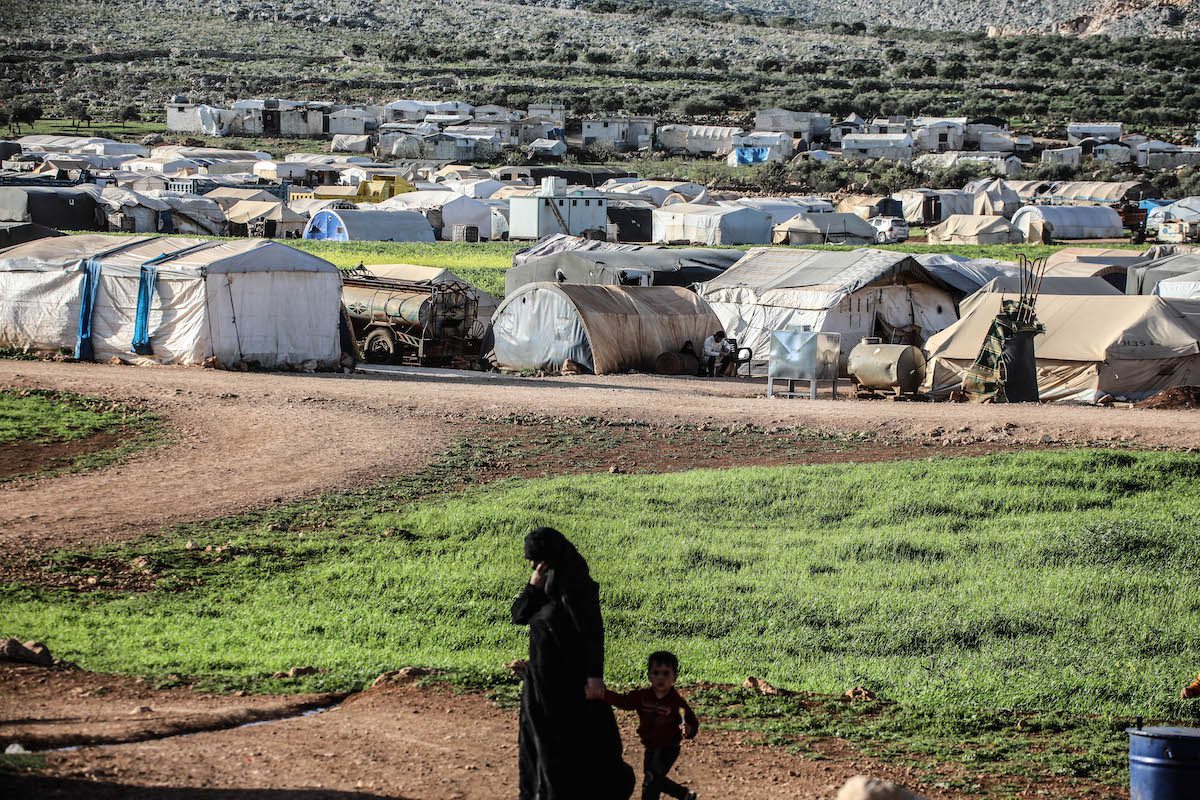 A view from a camp, where Syrian displaced civilians shelter in after the attacks of the Assad regime and its supporters, in Idlib, Syria on April 11, 2022. [İzzettin Kasım - Anadolu Agency]