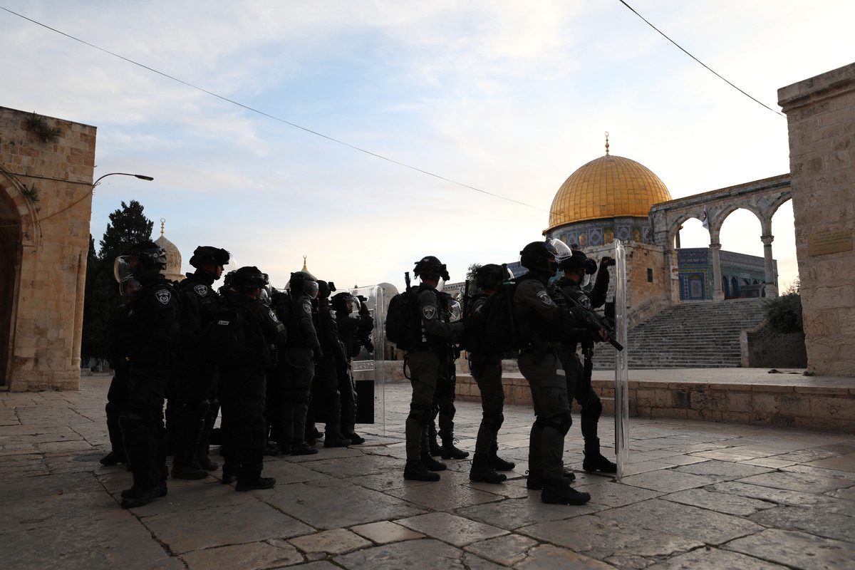 Israeli forces raid with blast bomb and rubber bullets after a morning prayer at Masjid al-Aqsa in East Jerusalem [Mostafa Alkharouf - Anadolu Agency]