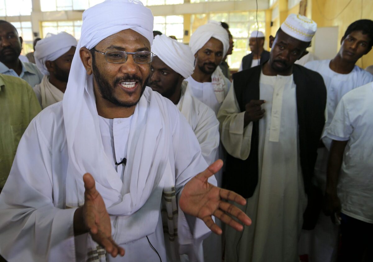 Sudanese hardline Islamist cleric Mohamed Ali Jazuli speaks to people at a mosque in the capital Khartoum following Friday prayers, on November 29, 2019. - Ousted president Omar al-Bashir's party today condemned Sudan's new "illegal government" for ordering its closure and the dismantling of his regime that ruled the country for 30 years. Sudan's new authorities yesterday approved a law ordering the Islamist leader's National Congress Party to be dissolved, its assets confiscated and the regime dismantled as demanded by the protest movement that led to Bashir's fall in April. (Photo by ASHRAF SHAZLY / AFP) (Photo by ASHRAF SHAZLY/AFP via Getty Images)