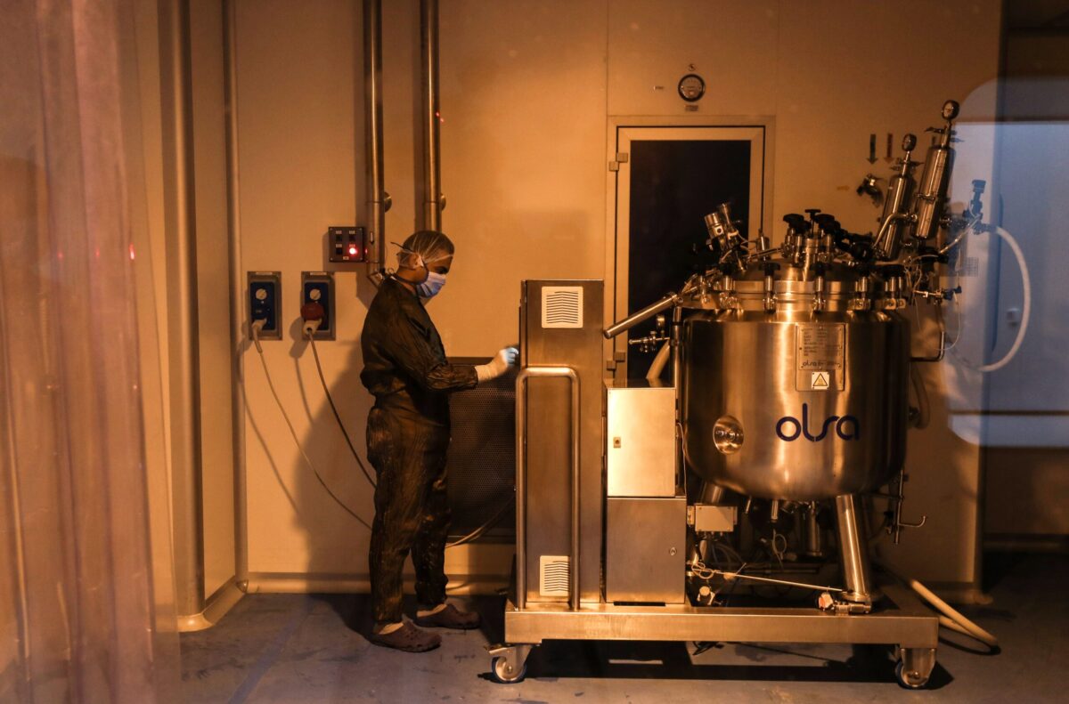 A lab technician works at the Eva Pharma facility in the Egyptian capital's twin city of Giza on July 12, 2020. - Egyptian pharmaceutical firm Eva Pharma has been producing Remdsivir, a medicine for coronavirus patients. (Photo by Mohamed el-Shahed / AFP) (Photo by MOHAMED EL-SHAHED/AFP via Getty Images)