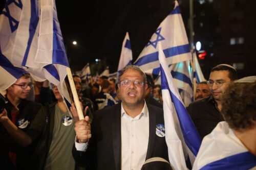 Itamar Ben-Gvir (C), member of Israel's Knesset near Tel Aviv [AHMAD GHARABLI/AFP/Getty Images]