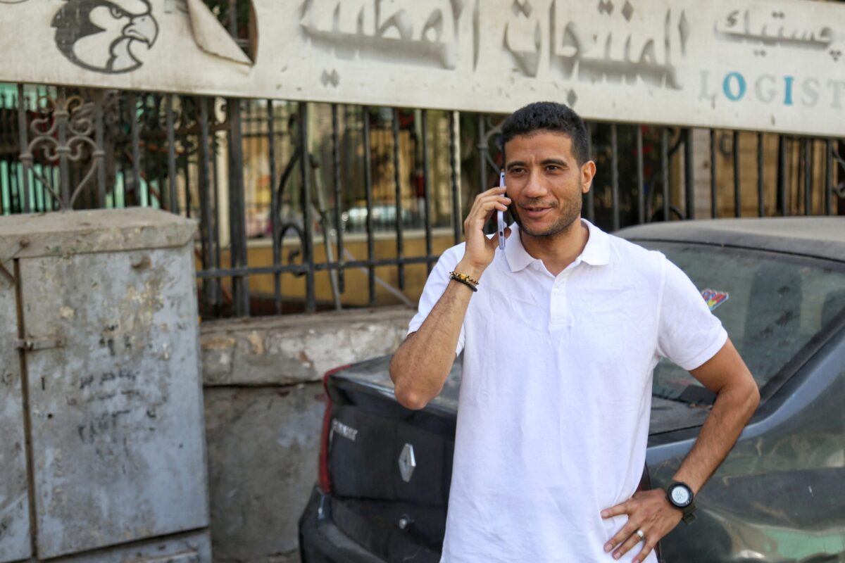Egyptian journalist Mohamed Salah talks on the phone in Cairo following his release from the police station in al-Abassya district, on April 24, 2022 [MOHAMED EL-RAAI/AFP via Getty Images]