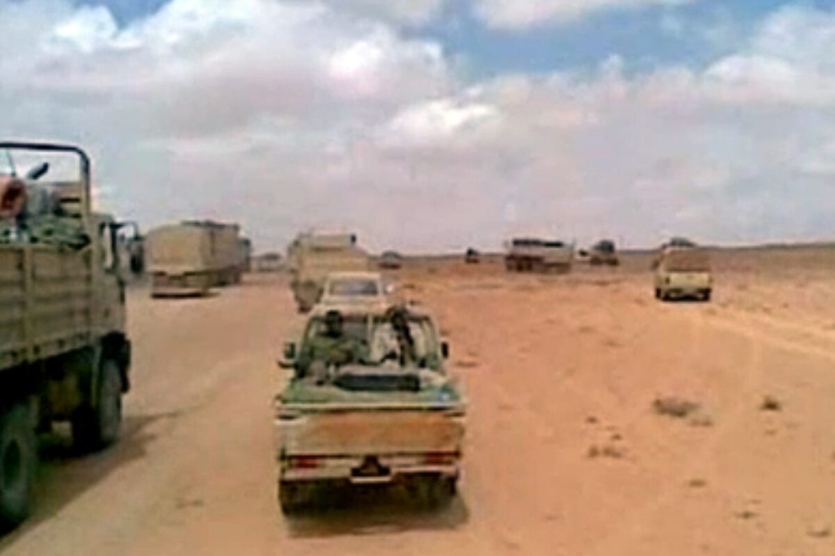 A convoy in the desert [STRINGER/AFP via Getty Images]