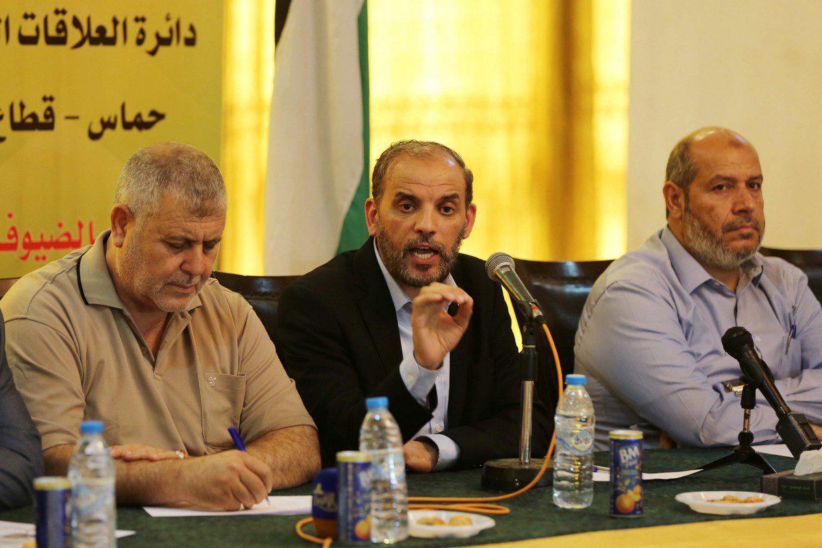 Palestinian Hamas official Husam Badran (C) in Gaza City on 5 August 2018 [Ashraf Amra/ApaImages]