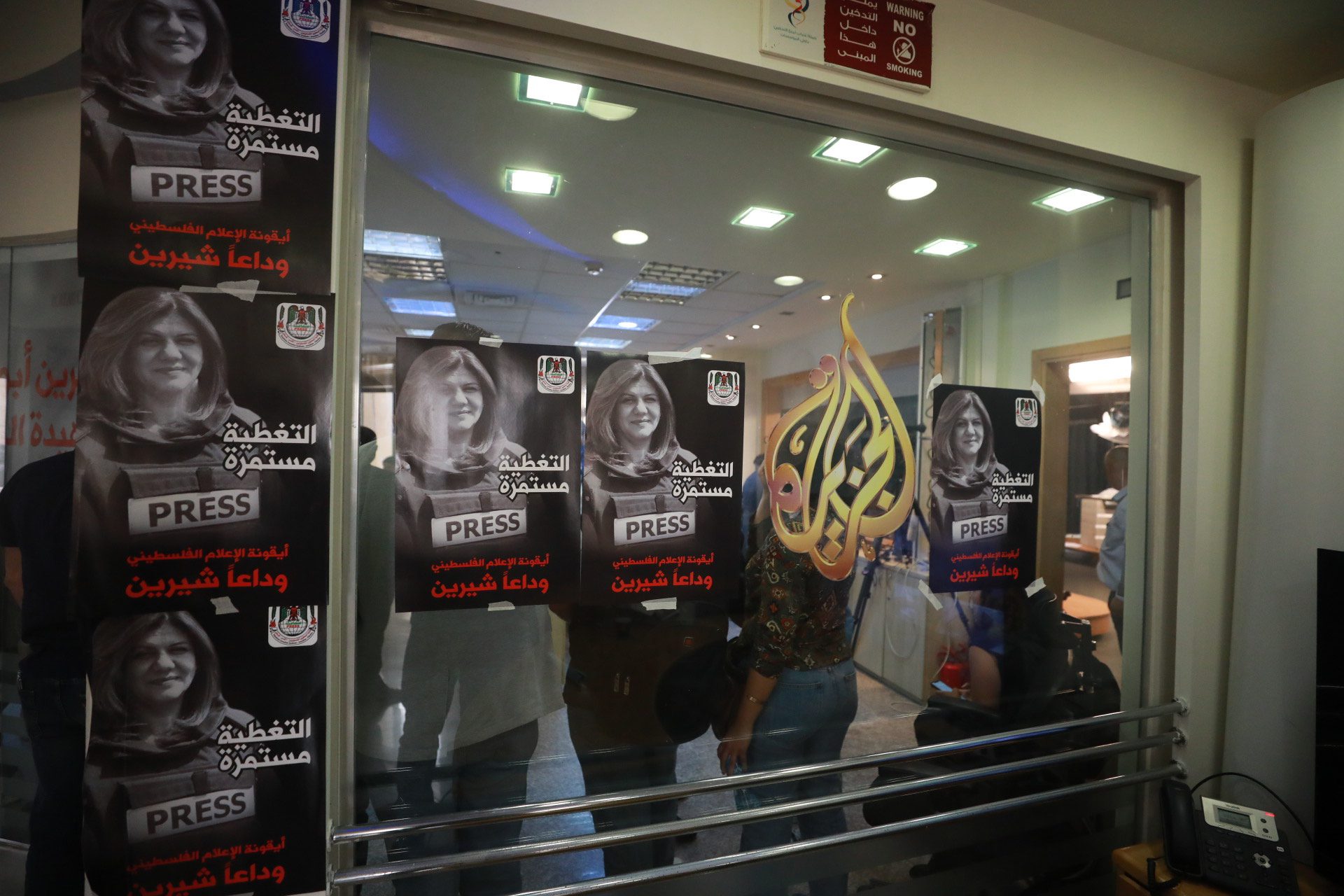 Colleagues and relatives of Al Jazeera’s journalist Shirin Abu Akile gather at the Al Jazeera’s office in Ramallah, West Bank. [Issam Rimawi - Anadolu Agency]