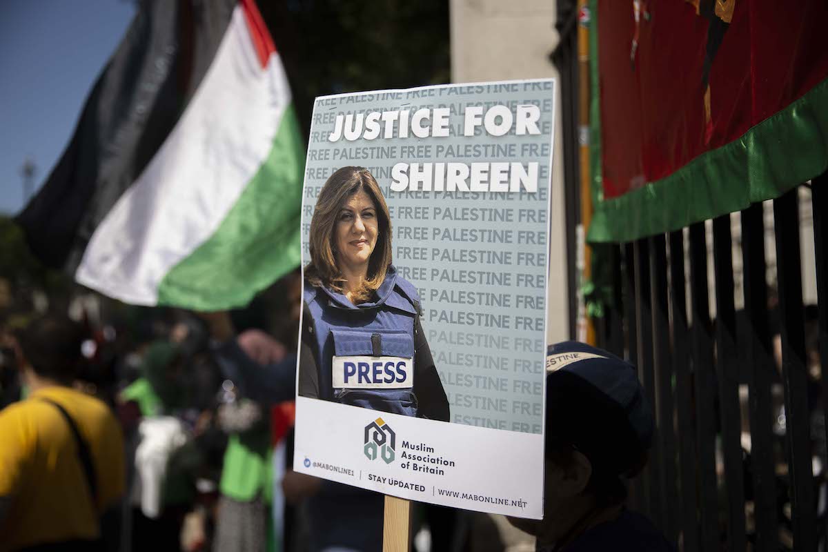 People gather to protest the killing of Al Jazeera journalist Shireen Abu Akleh while covering an Israeli raid in West Bank, within events markings the 74th anniversary of the Nakba, also known as Day of the Catastrophe in 1948, in London, United Kingdom on May 14, 2022. [Raşid Necati Aslım - Anadolu Agency]