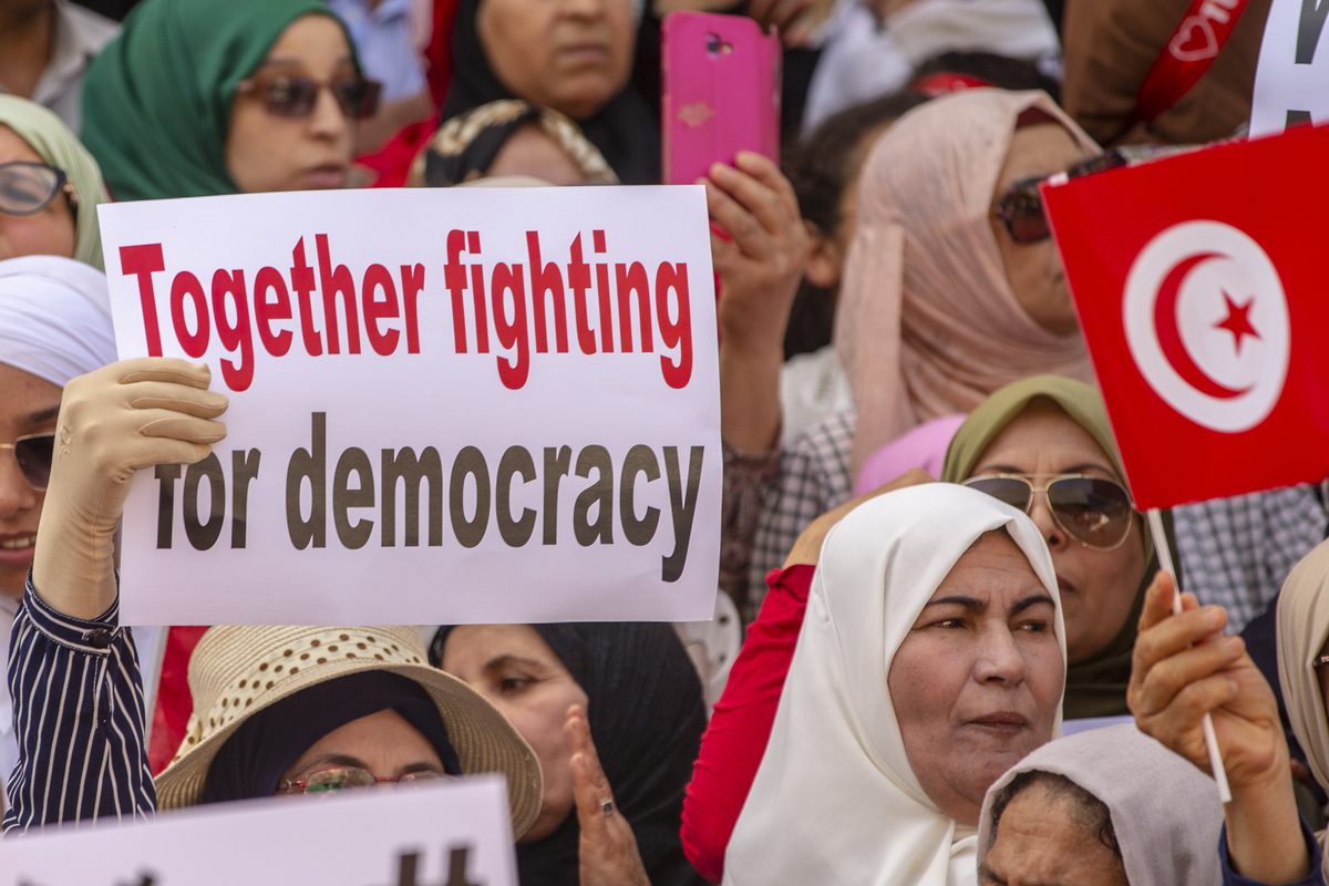 A group of people gather outside Municipal Theater to protest Tunisian President Kais Saied in Tunis, Tunisia on May 15, 2022. [Yassine Gaidi - Anadolu Agency]