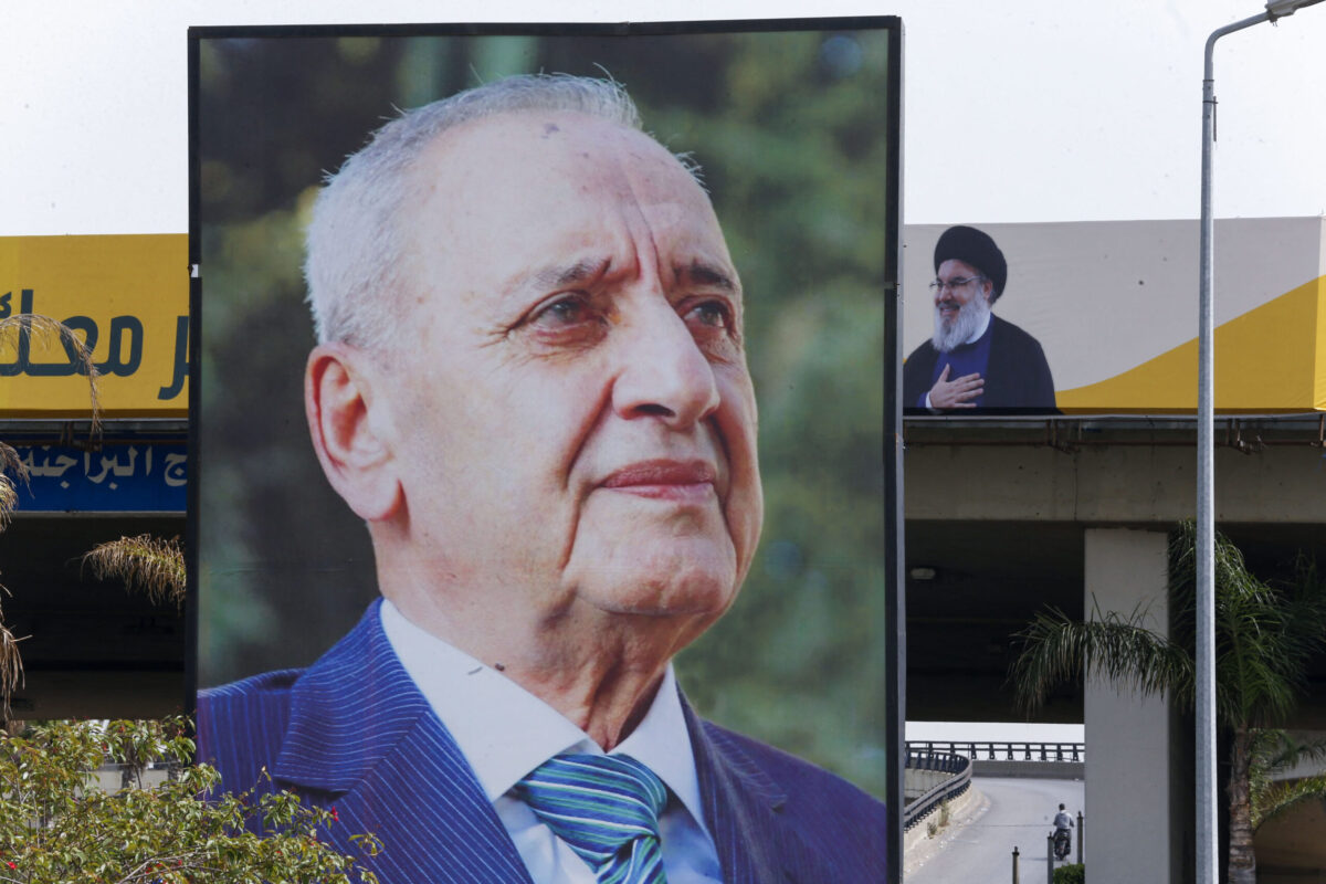 Billboards depicting the leaders of Lebanon's Shiite groups Amal, Parliament Speaker Nabih Berri (L), and Hezbollah, Hassan Nasrallah, hang on a main road in the capital Beirut, on May 14, 2022, on the eve of parliamentary elections. (Photo by LOUAI BESHARA / AFP) (Photo by LOUAI BESHARA/AFP via Getty Images)