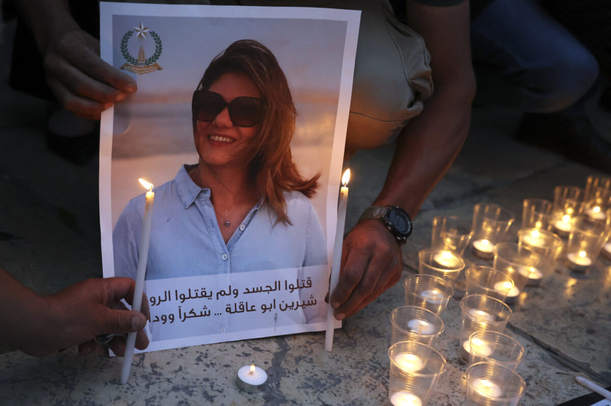 Family and friends of al-Jazeera reporter Shireen Abu Akleh, Anton Abu Akleh, attend a candle vigil outside the Church of the Nativity in the West Bank Biblical city of Bethlehem on May 16, 2022 [HAZEM BADER/AFP via Getty Images]
