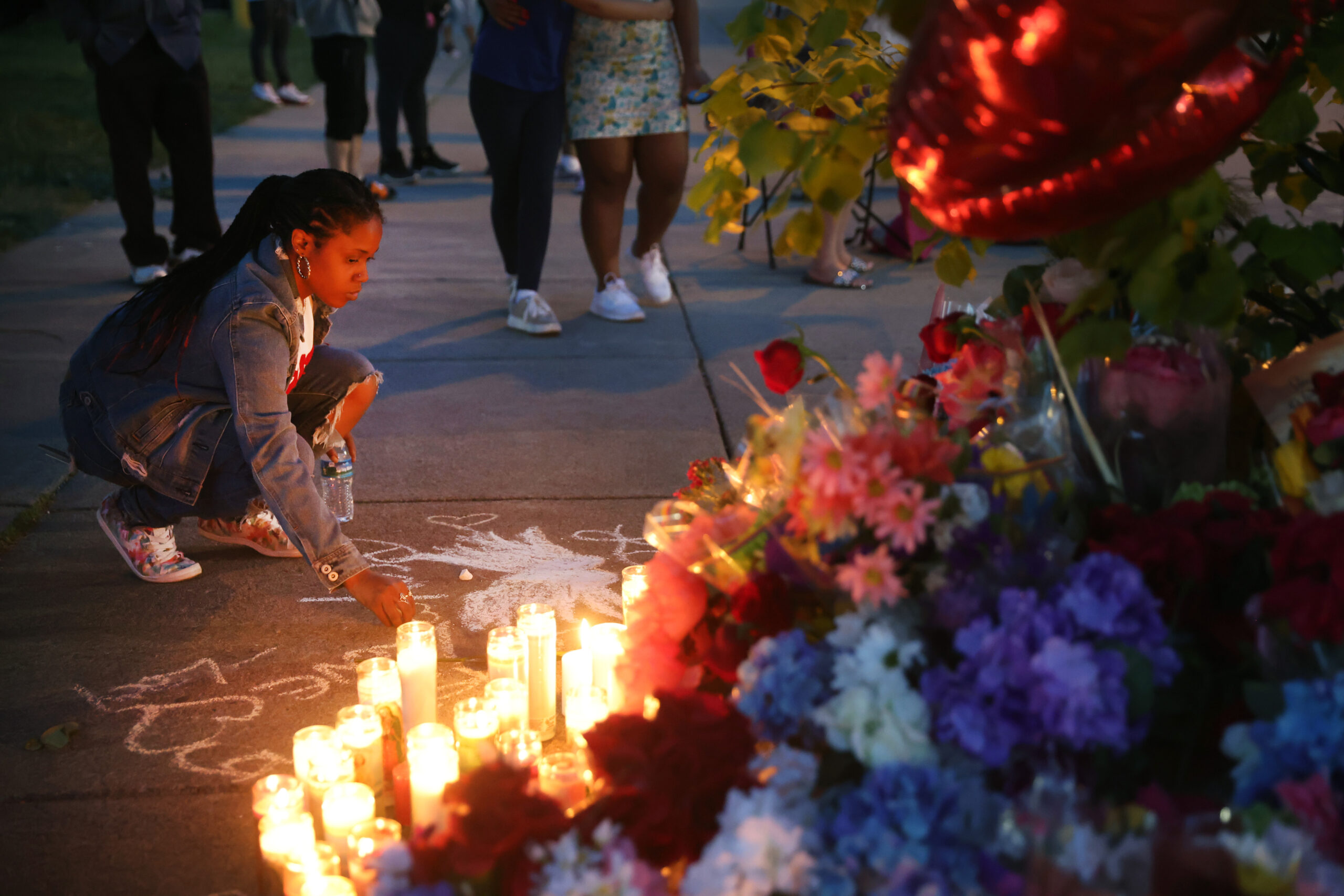 A memorial outside of Tops market after a gunman opened fire at the store in Buffalo, New York on May 15, 2022 [Scott Olson/Getty Images]