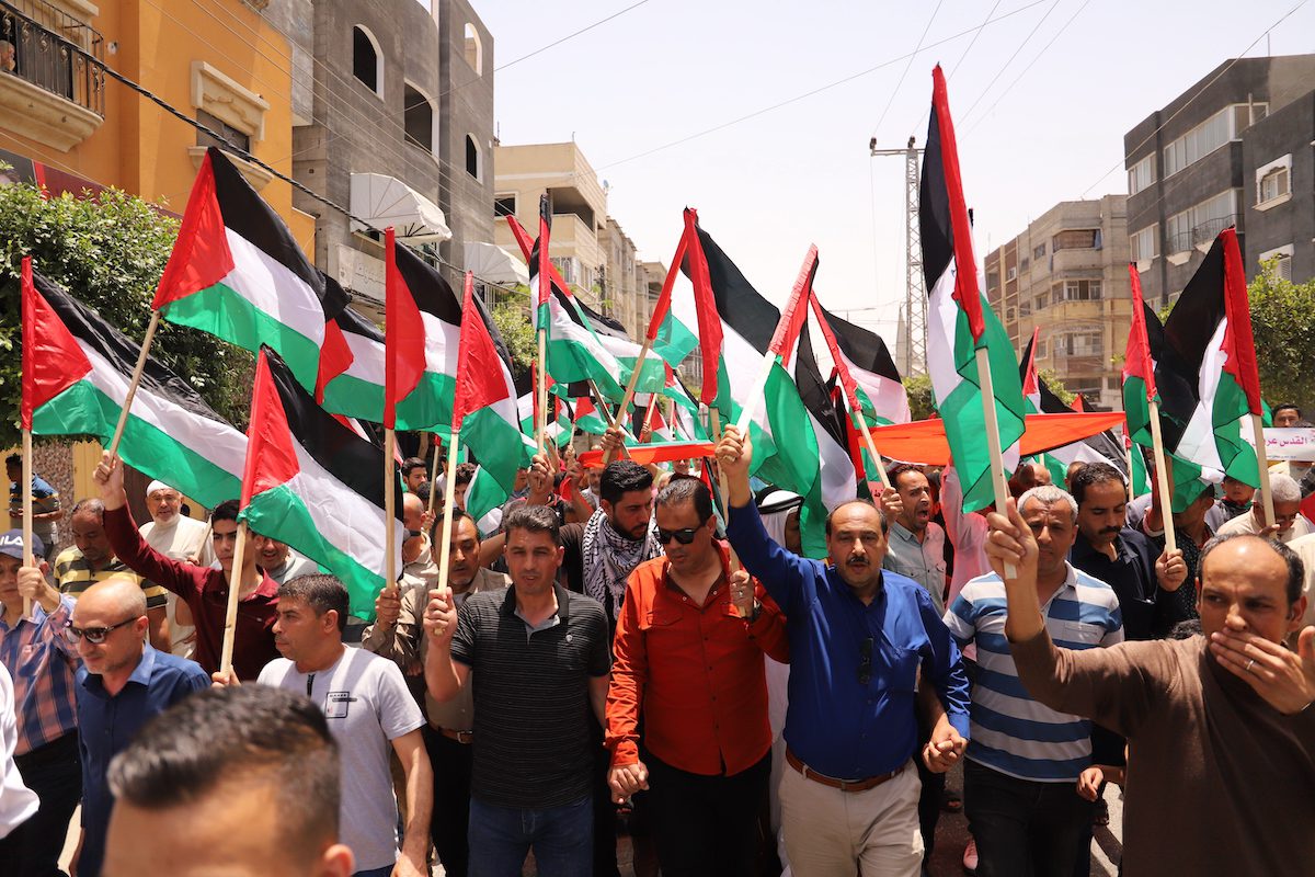 Gaza holds flag march to counter right-wing Israeli procession in Jerusalem, in Gaza, on 29 May 2022 [Mohammed Asad/Middle East Monitor]