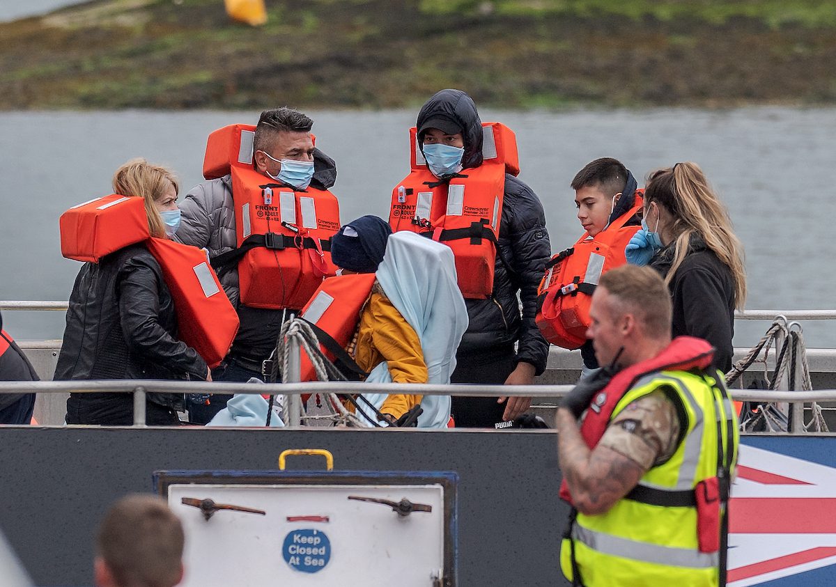 Border Force boat Defender escorted 60 migrants back to dover this morning after they were picked up in the English Channel Border Force officials and the military helped the migrants ashore back at Dover Docks, on June 24, 2022. [Stuart Brock - Anadolu Agency]