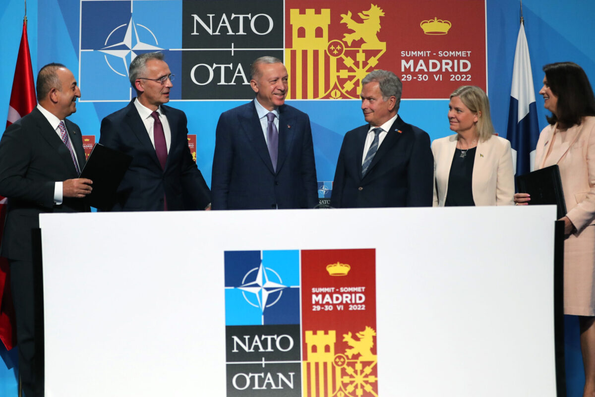 Turkish President Recep Tayyip Erdogan, NATO Secretary-General Jens Stoltenberg, Sweden's Prime Minister Magdalena Andersson, Finland's President Sauli Niinisto, Turkish Foreign Minister Mevlut Cavusoglu attend a signing ceremony of a memorandum on the Nordic countries’ NATO in Madrid, Spain on June 28, 2022 [TUR Presidency/ Murat Cetinmuhurdar/Anadolu Agency]